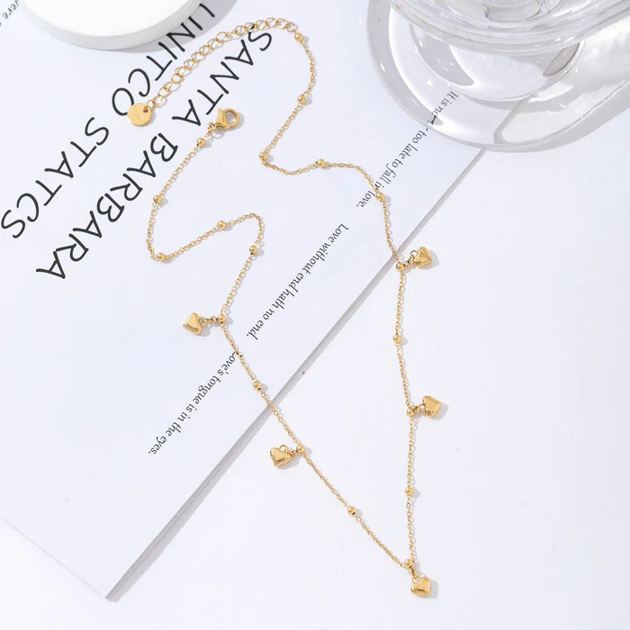 Gouden Hartjes Ketting – Elegant & Liefdevol